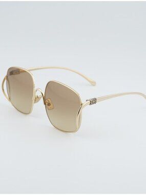 Miu Miu MUA57S 5AK20S Sunglasses Gold Square Frame, Brown Gradient Lenses